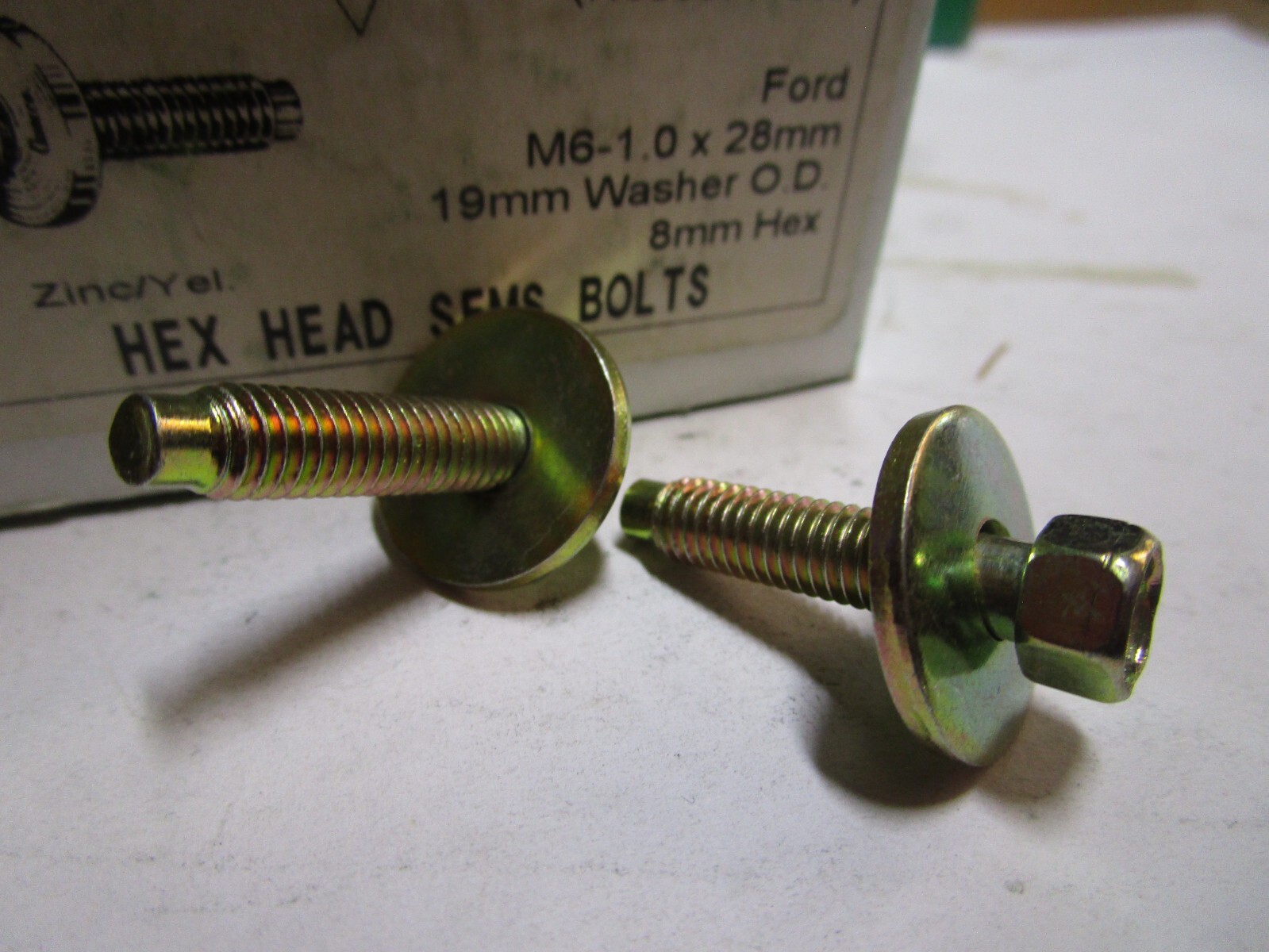 Auveco 12335 M6-1.0 X 28mm Indented Hex Washer Head SEMS w/Dog – Zinc box of 25