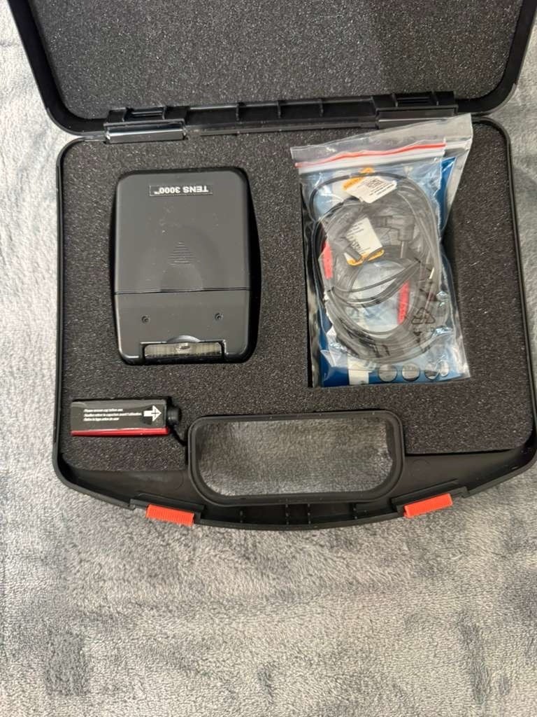 Roscoe Medical TENS 3000, a portable Unit for pain relief W/ Back Support