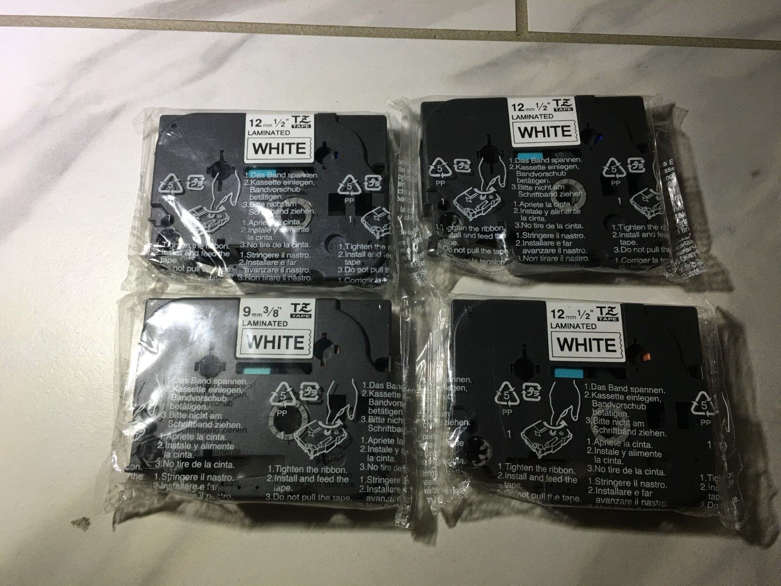 Lot of 4 Brother P-Touch TZ-231 , 1/2 in (12mm) Laminated Label Tape, Black ink
