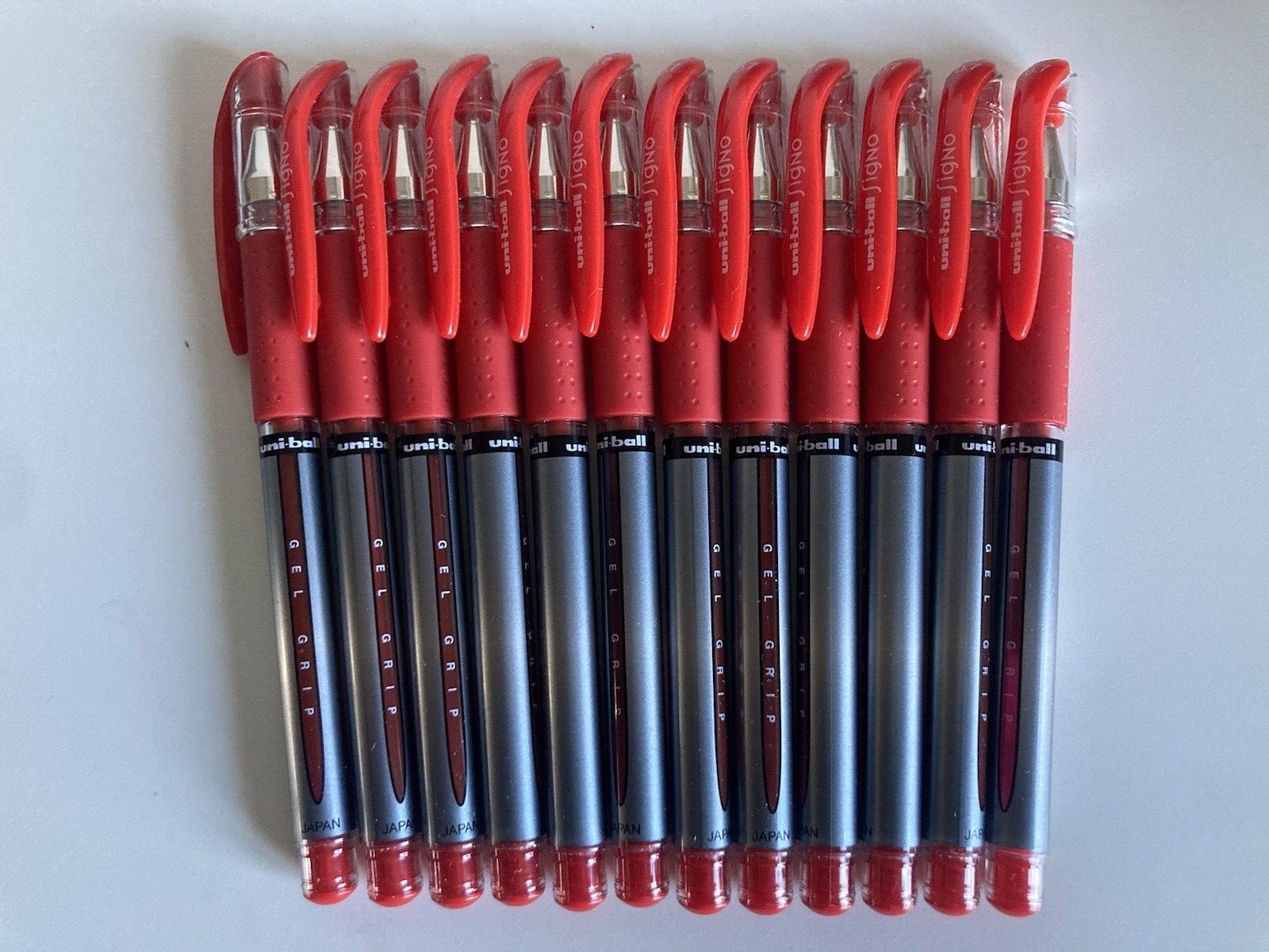 (12-CT) uni-ball Signo Gel GRIP Roller Ball Stick Gel Pen Red Ink Medium 65452