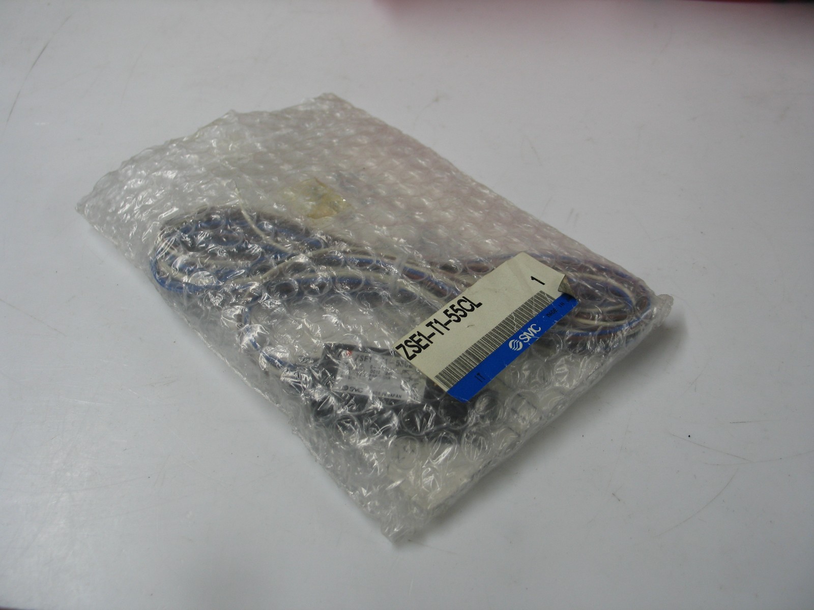 NIB SMC ZSE1-T1-55CL VACUUM PRESSURE SWITCH 0-102KPA 12-24VDC A1410
