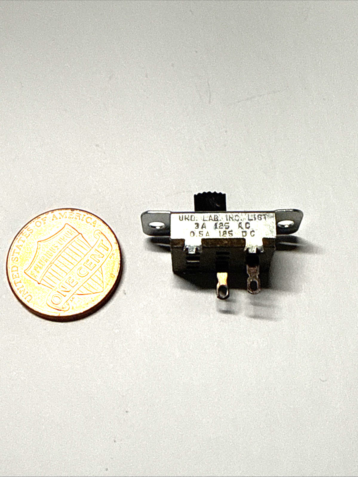 one SPST Slide Switch 3A- 125 VAC / 0.5A -125 VDC made by STACKPOLE